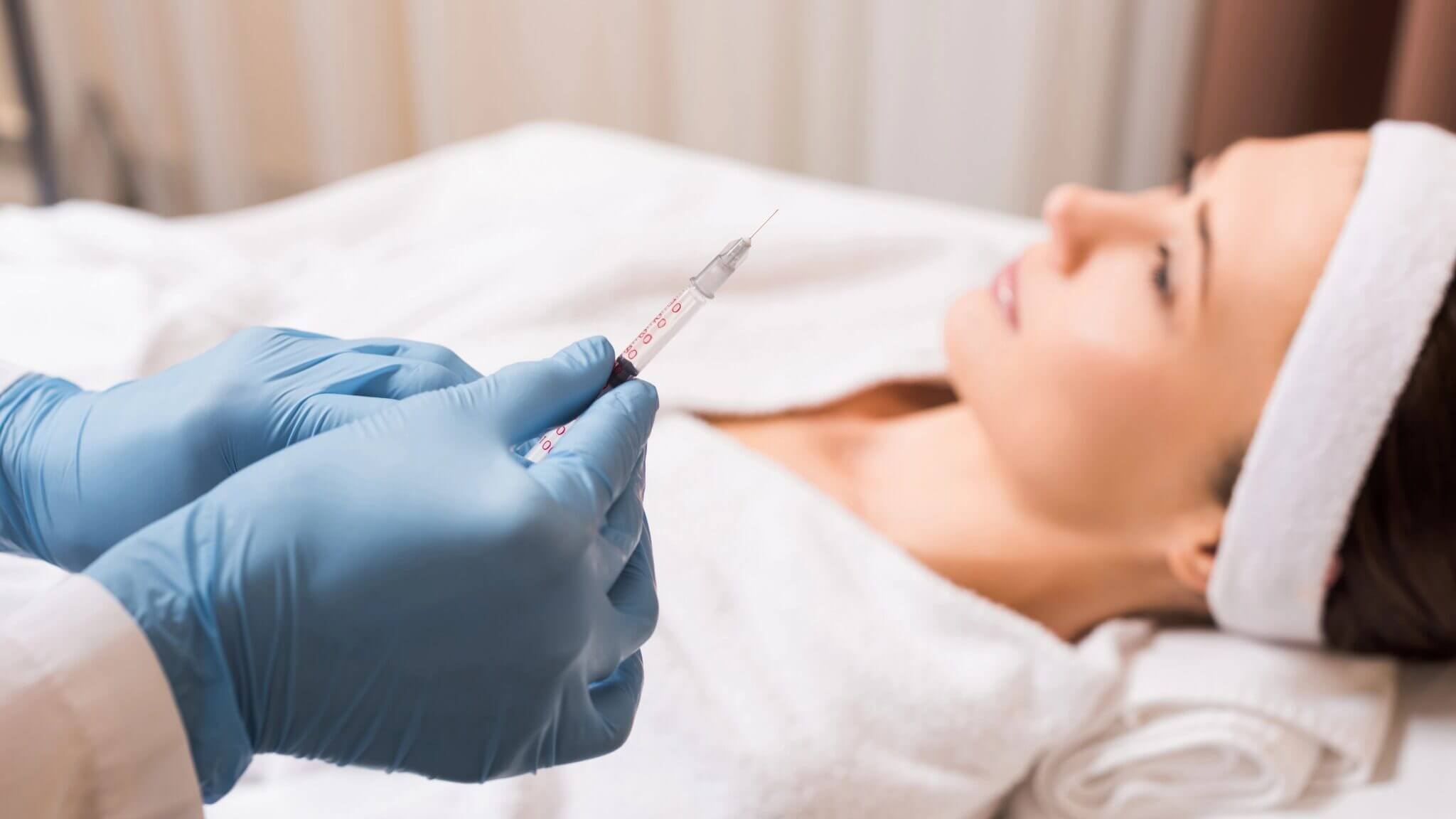 Medical Professional with Peptides Treatment